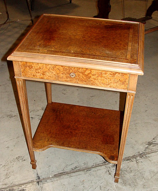 Appraisal: Continental Neoclassical style walnut and inlaid birdseye maple side table