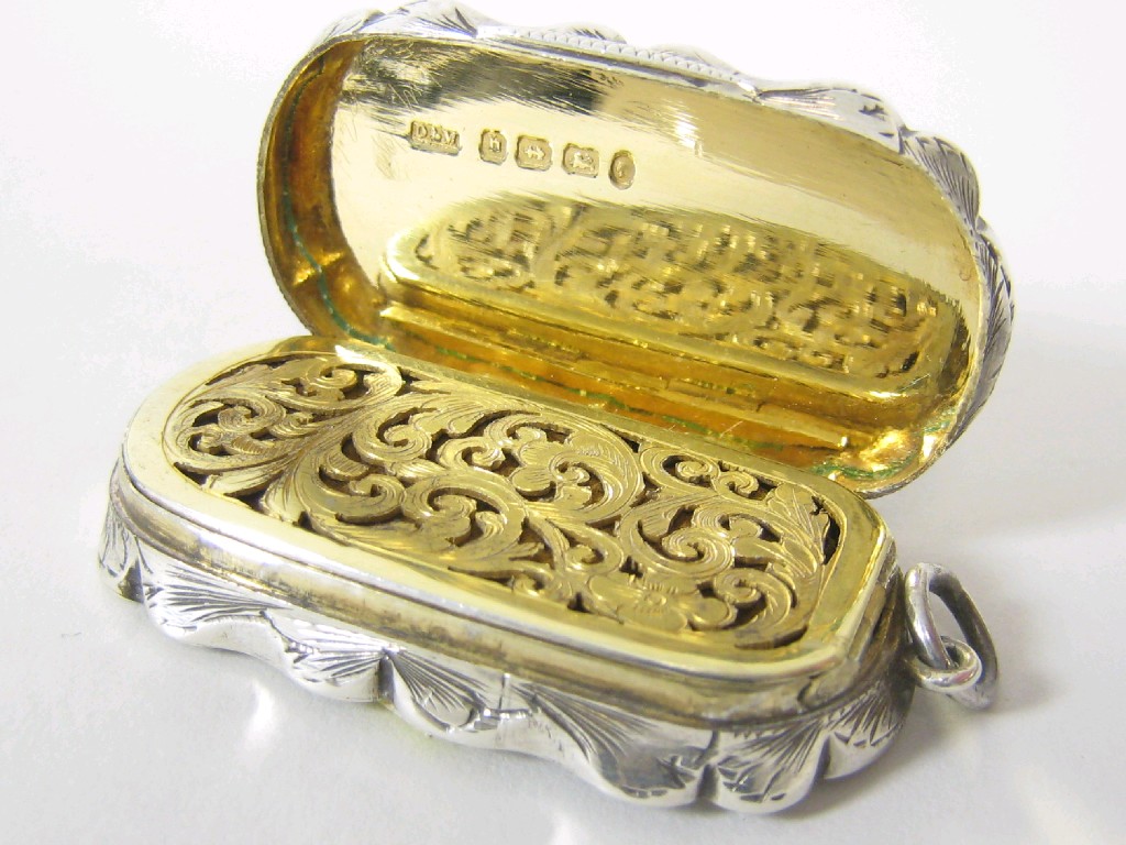 Appraisal: A Victorian large shaped oval Vinaigrette engraved initials within circular