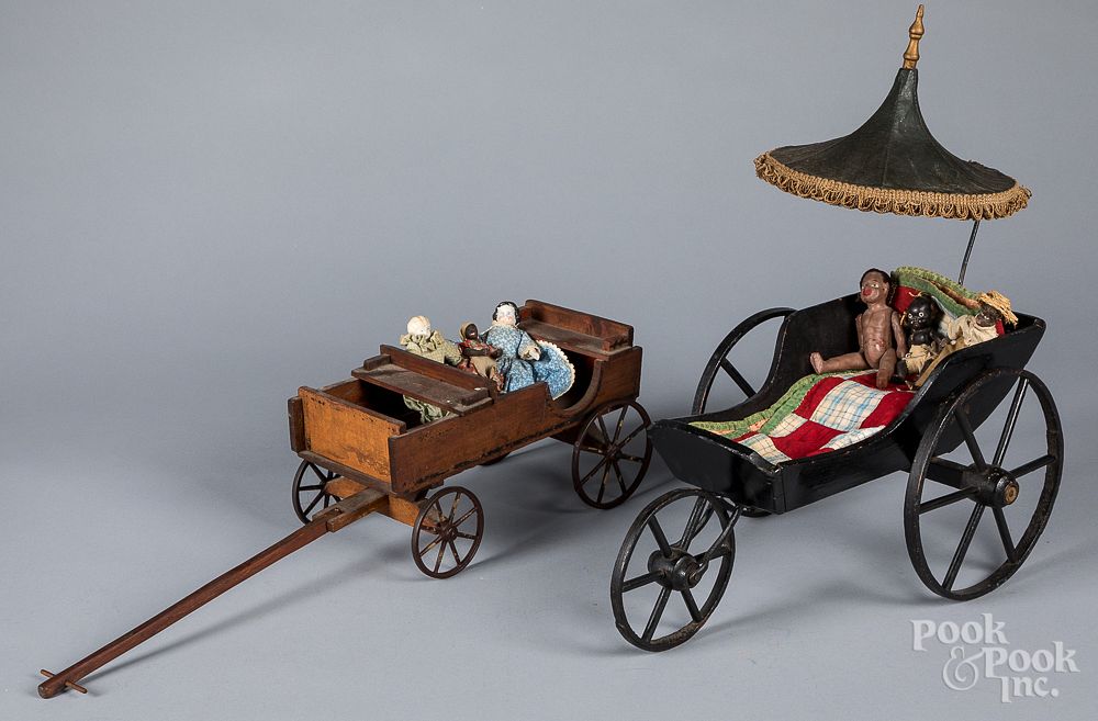 Appraisal: Wood doll wagon with cast iron wheels etc Wood doll