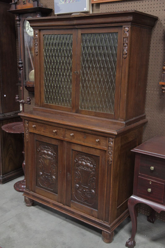 Appraisal: STEPBACK CUPBOARD Oak having a molded cornice diamond pattern vaseline