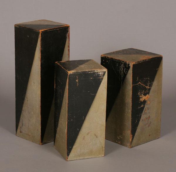 Appraisal: Lot of three Art Deco block pedestals with geometric airbrush