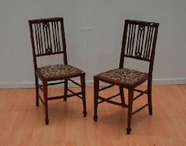 Appraisal: A pair of Edwardian mahogany single chairs