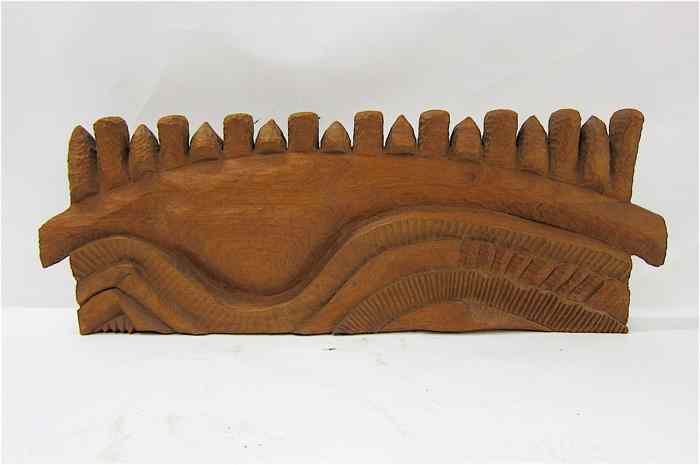 Appraisal: NORTHWEST CARVED WOOD SCULPTURE an abstract composition possibly depicting a