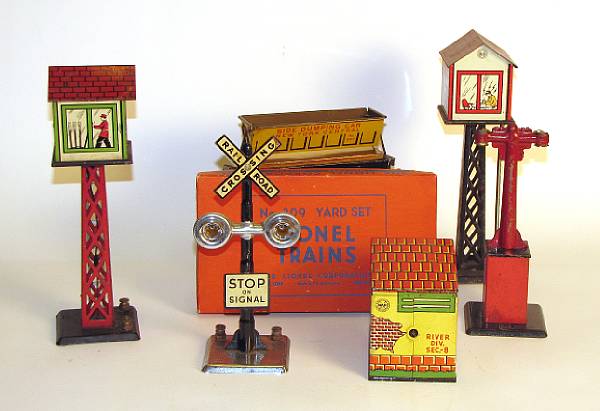 Appraisal: Train accessories and cars Quantity of accessories including bridges towers