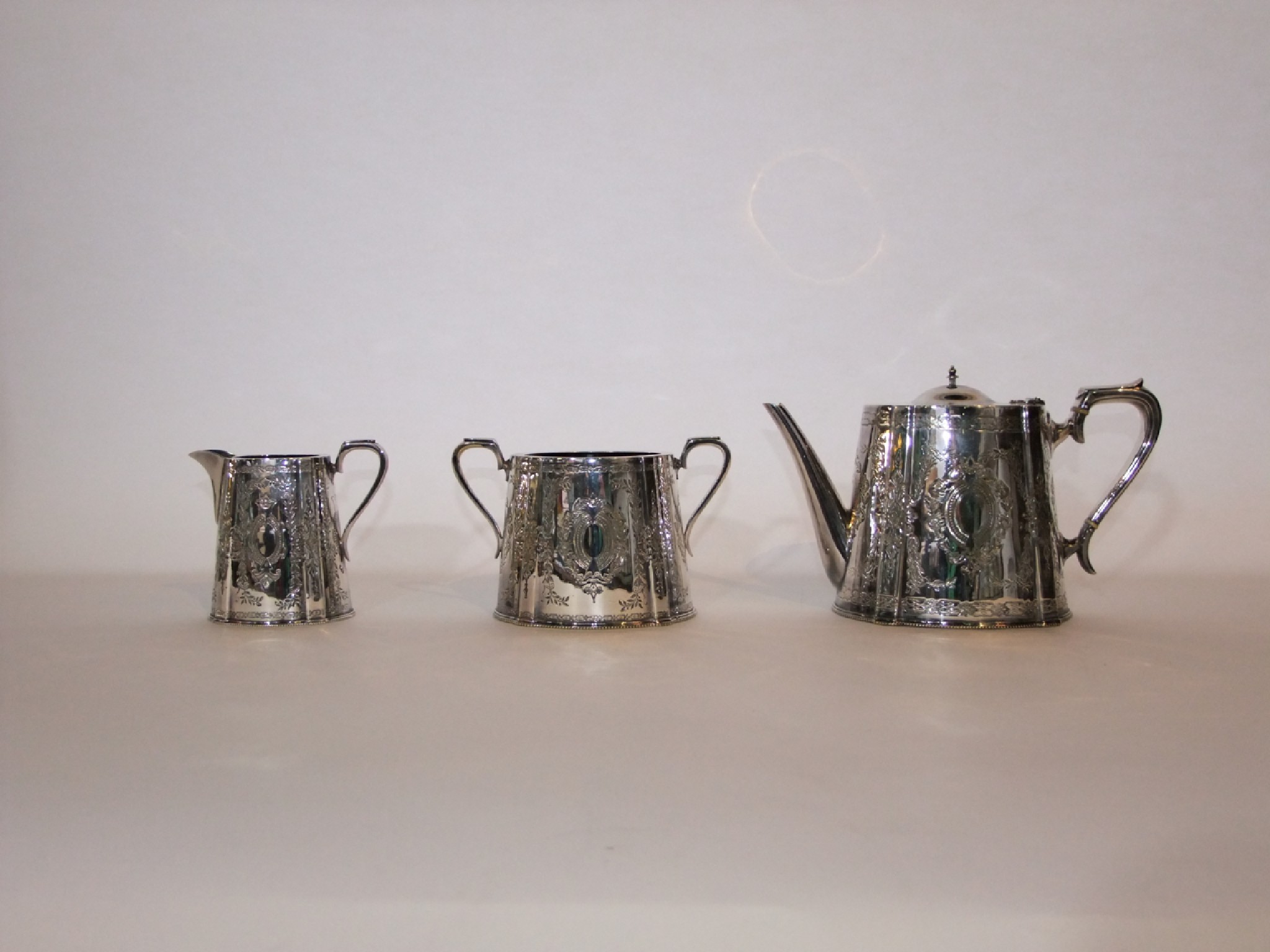 Appraisal: A th century A silver-plated teapot two-handled sugar basin and