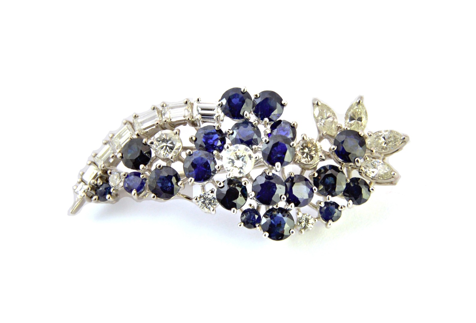 Appraisal: A sapphire and diamond set brooch designed as a spray