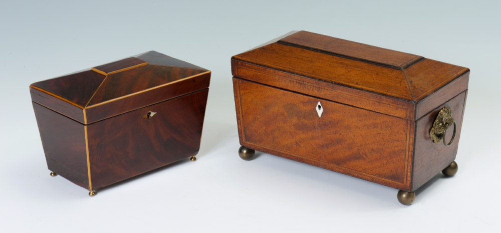 Appraisal: ANTIQUE TEA CADDIES Richly grained mahogany sarcophagus form with hinged