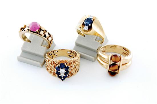 Appraisal: Gemstone and gold rings two blue sapphire and diamond rings