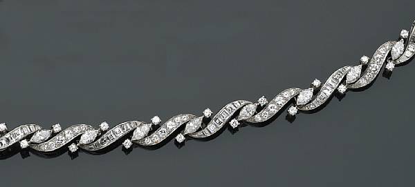 Appraisal: A diamond and platinum bracelet Oscar Heyman designed as stylized