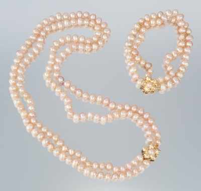 Appraisal: A Pink Pearl Necklace and Bracelet Set k yellow gold