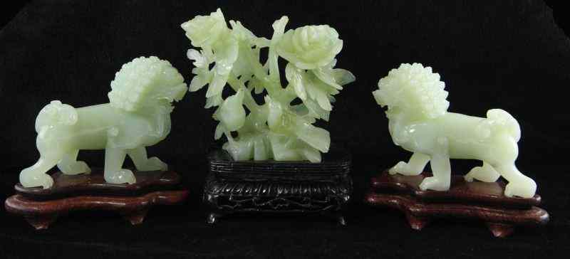 Appraisal: Three Modern Chinese Hardstone Carvingsincluding a pair of Buddhist lions