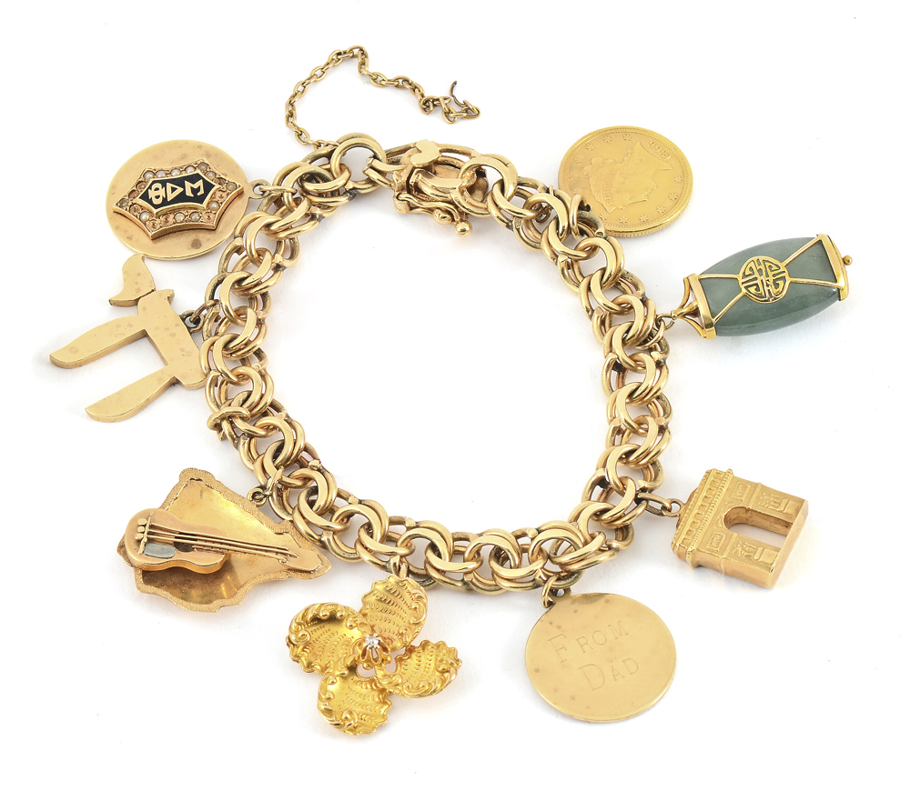 Appraisal: K GOLD CHARM BRACELET Vintage double loop charm bracelet with