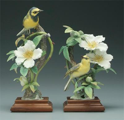 Appraisal: Two Doughty bird figurines hooded warbler and Cherokee rose black