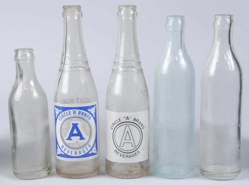 Appraisal: Lot of Circle A Brand Dr Pepper Related Bottles Description