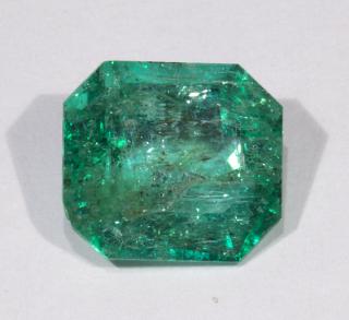 Appraisal: Unmounted emerald Unmounted emerald the emerald-cut emerald measures approximately x