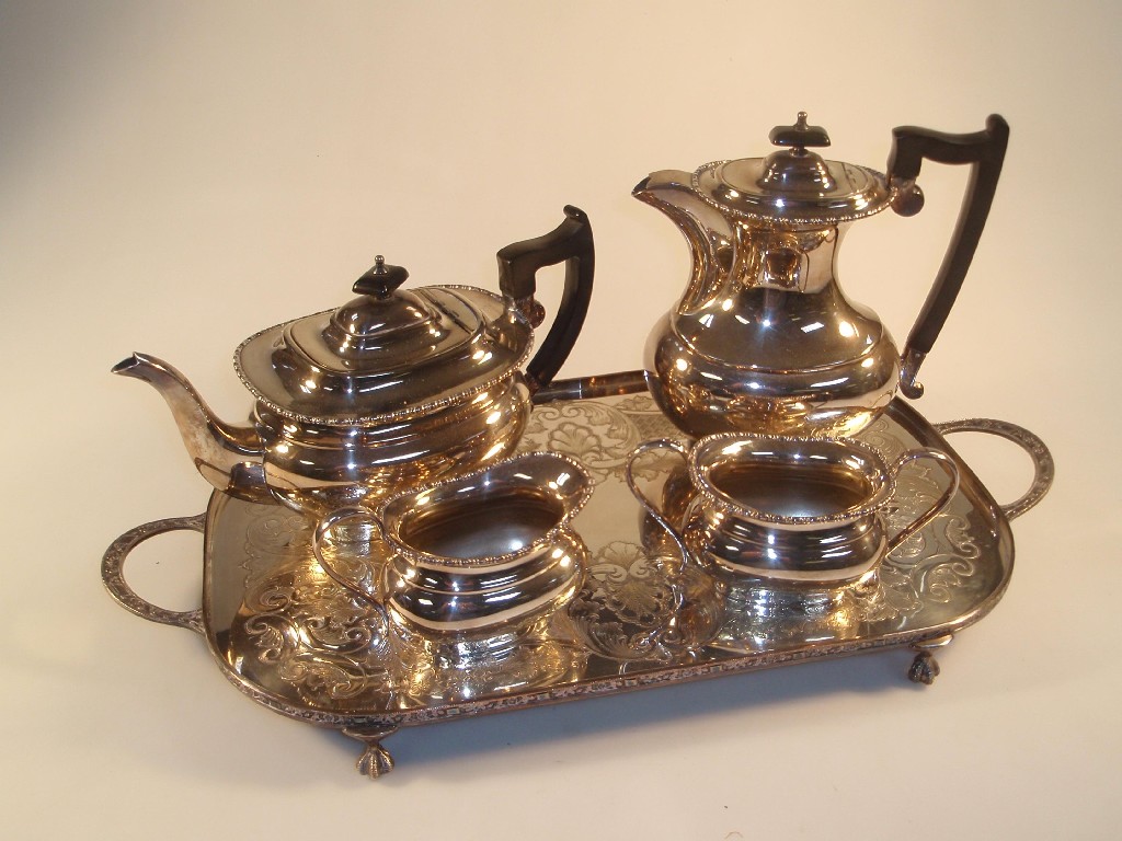 Appraisal: A Viners EPNS four-piece tea service together with a two-handled