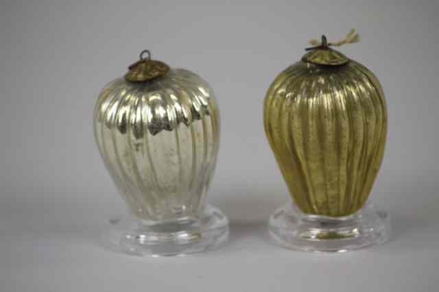 Appraisal: TWO RIBBED EGG KUGELS Germany includes gold ribbed teardrop and