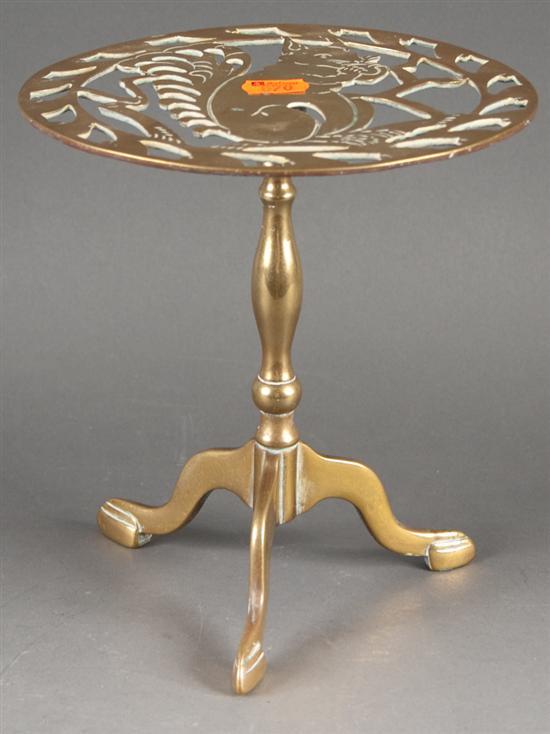 Appraisal: Chippendale style pierced brass fireplace trivet with squirrel decoration in