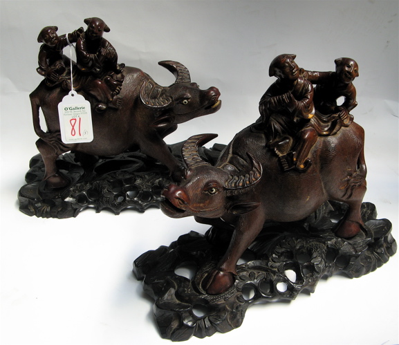 Appraisal: THREE CHINESE CARVED HARDWOOD FIGURAL GROUPS including a pair of