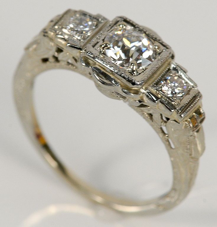 Appraisal: karat white gold ring set with center diamond approximately cts