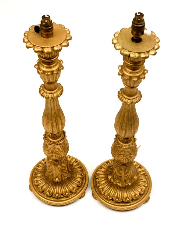 Appraisal: PAIR OF GILTWOOD TABLE LAMPS in Baroque style of baluster