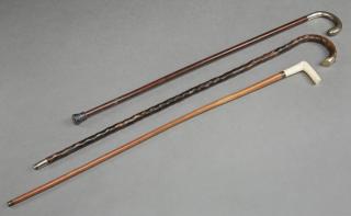 Appraisal: Group of Three Antique Canes c one with an L-shaped