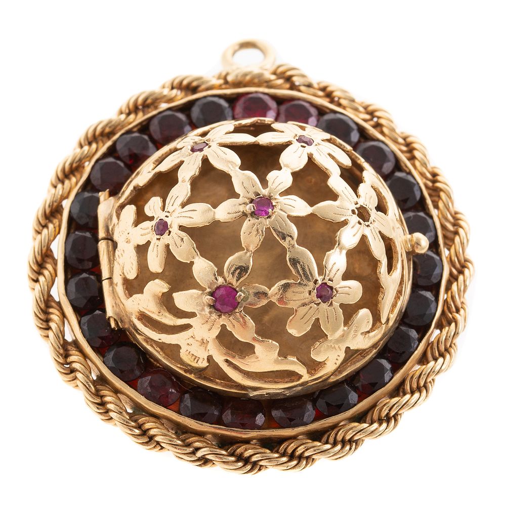 Appraisal: A Hand-Pierced Floral Ball Photo Pendant in K K yellow