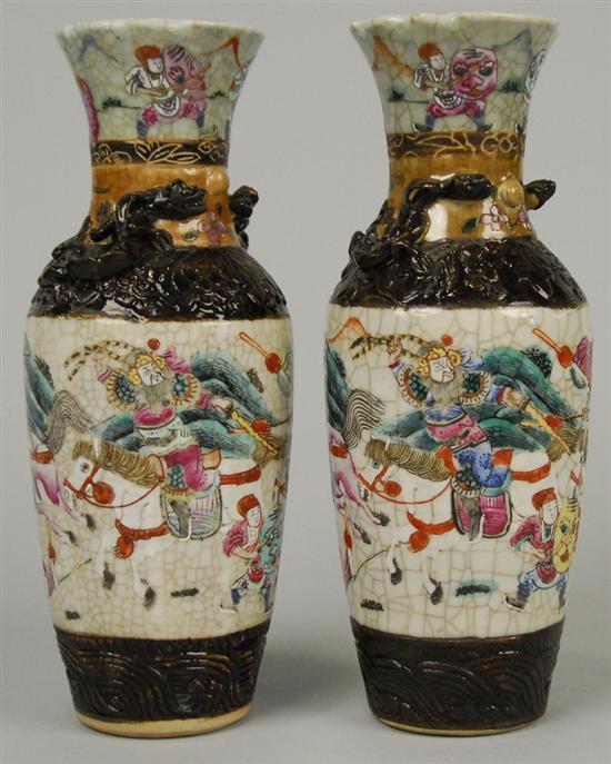 Appraisal: PAIR OF JAPANESE POLYLCHROME DECORATED CRACKLE GLAZE POTTERY VASES signed