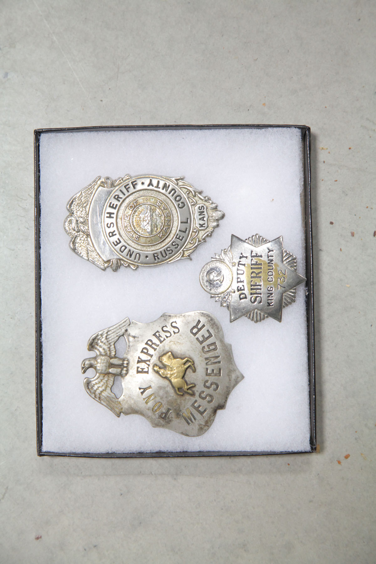 Appraisal: THREE BADGES American late th early th century White metal