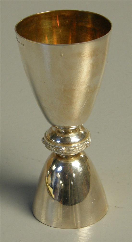 Appraisal: Irish silver gilt double single shot cup with a single