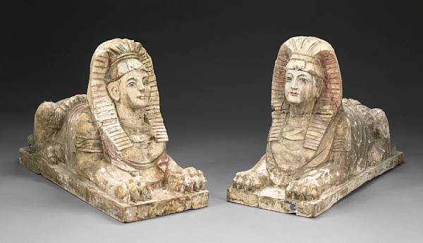 Appraisal: A pair of French partial paint decorated carved pine sphinxes