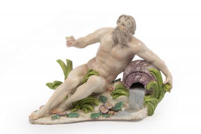 Appraisal: A Chelsea figure of a river God reclining on a