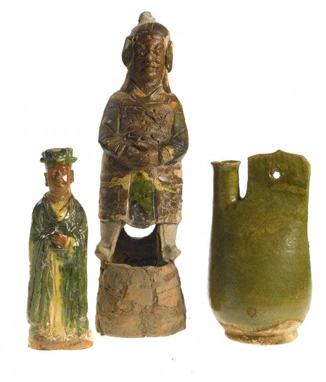 Appraisal: A GREEN GLAZED EARTHENWARE COCKSCOMB FLASK A SANCAI GLAZED FIGURE