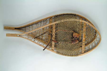 Appraisal: PAIR OF LARGE SNOWSHOES Rawhide and twine construction leather foot