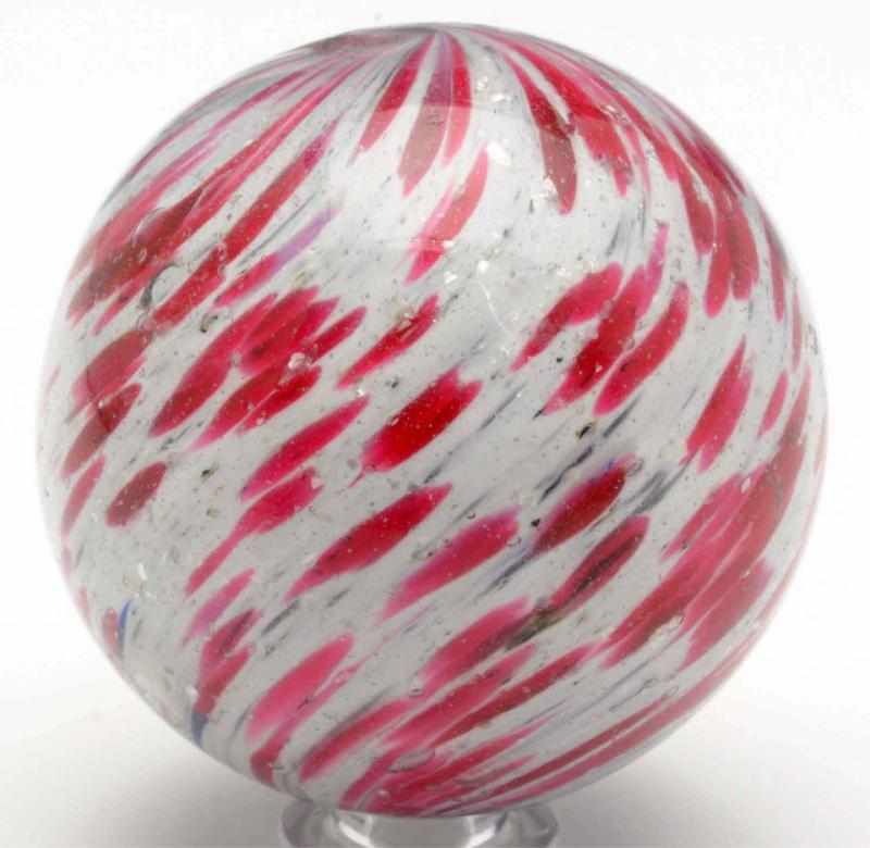 Appraisal: Large Onionskin Marble with Mica White base onionskin with red