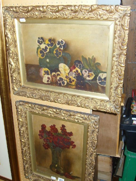 Appraisal: Two th century oil paintings on board still lives with