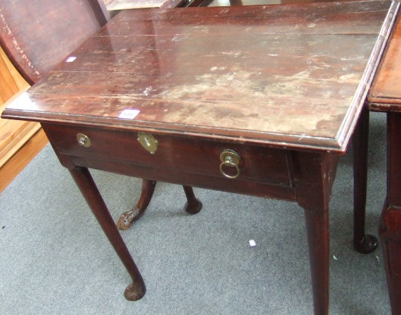 Appraisal: A George III mahogany side table the rectangular top over