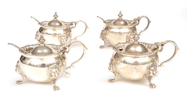 Appraisal: A SET OF FOUR EDWARD VII STERLING SILVER LIDDED MUSTARD