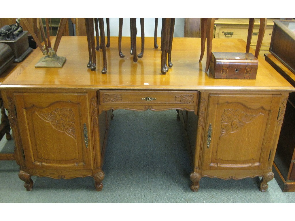 Appraisal: Carved oak partners desk