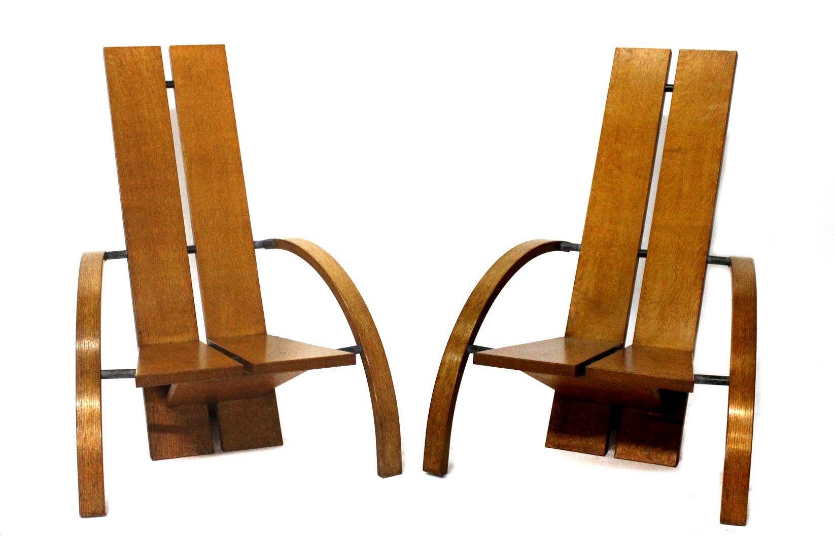 Appraisal: A pair of th century oak open arm easy chairs