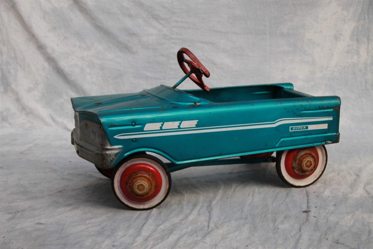 Appraisal: Super Dart pressed steel pedal car aquamarine and red surface