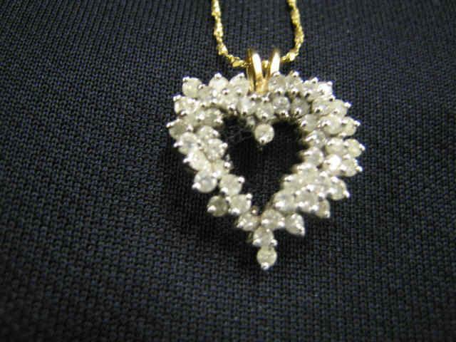 Appraisal: Diamond Heart Pendant diamonds total carats in k yellow gold