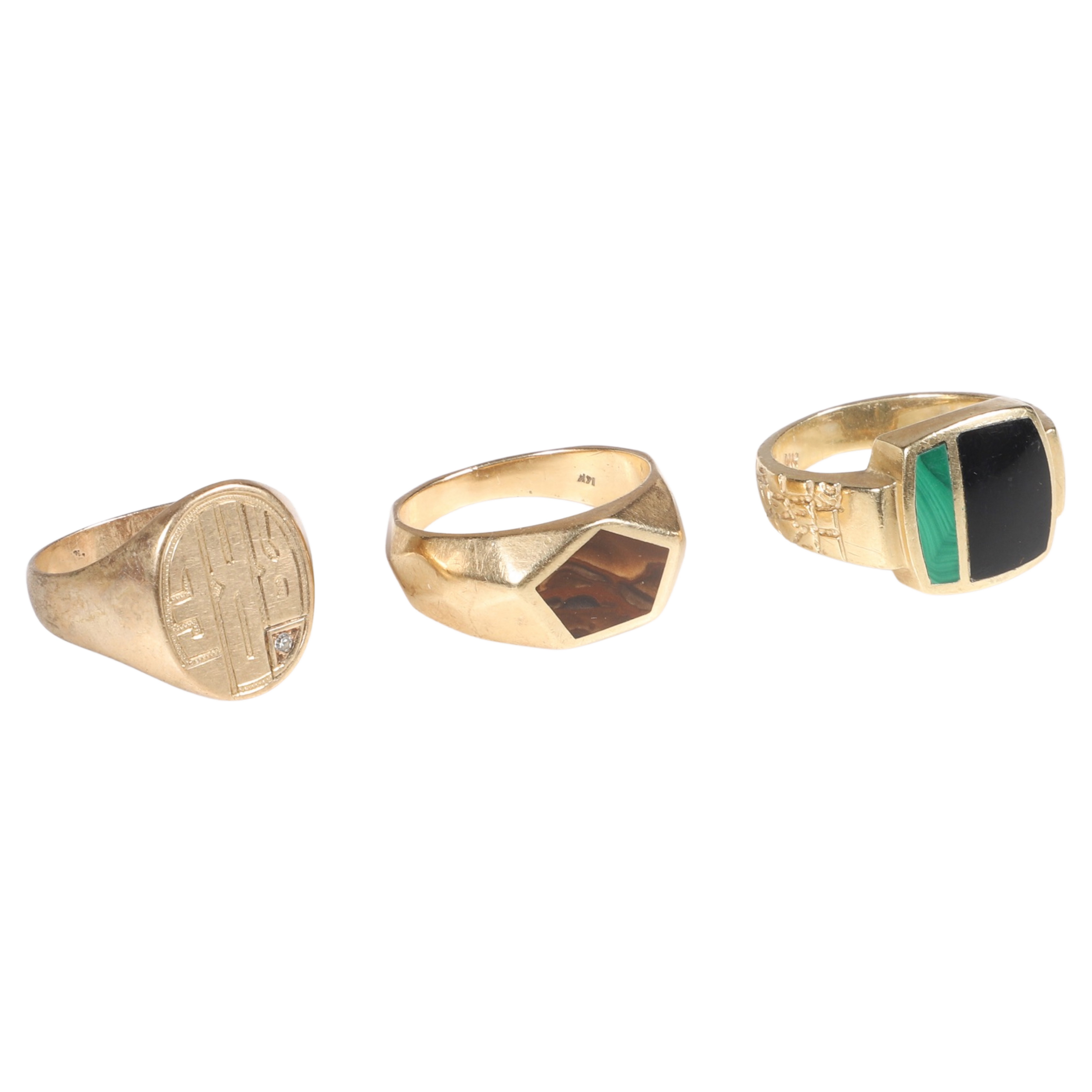 Appraisal: Mens gold rings to include K angular agate centered ring