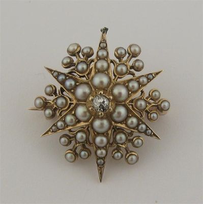 Appraisal: A half pearl and diamond star brooch c the six