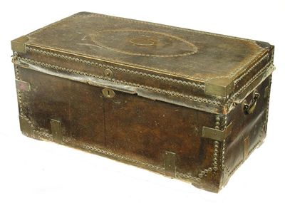 Appraisal: An early th century camphorwood trunk covered with brass studded