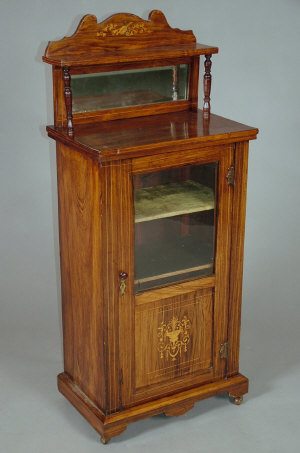 Appraisal: An Edwardian rosewood and inlaid music cabinet the bevelled mirrored