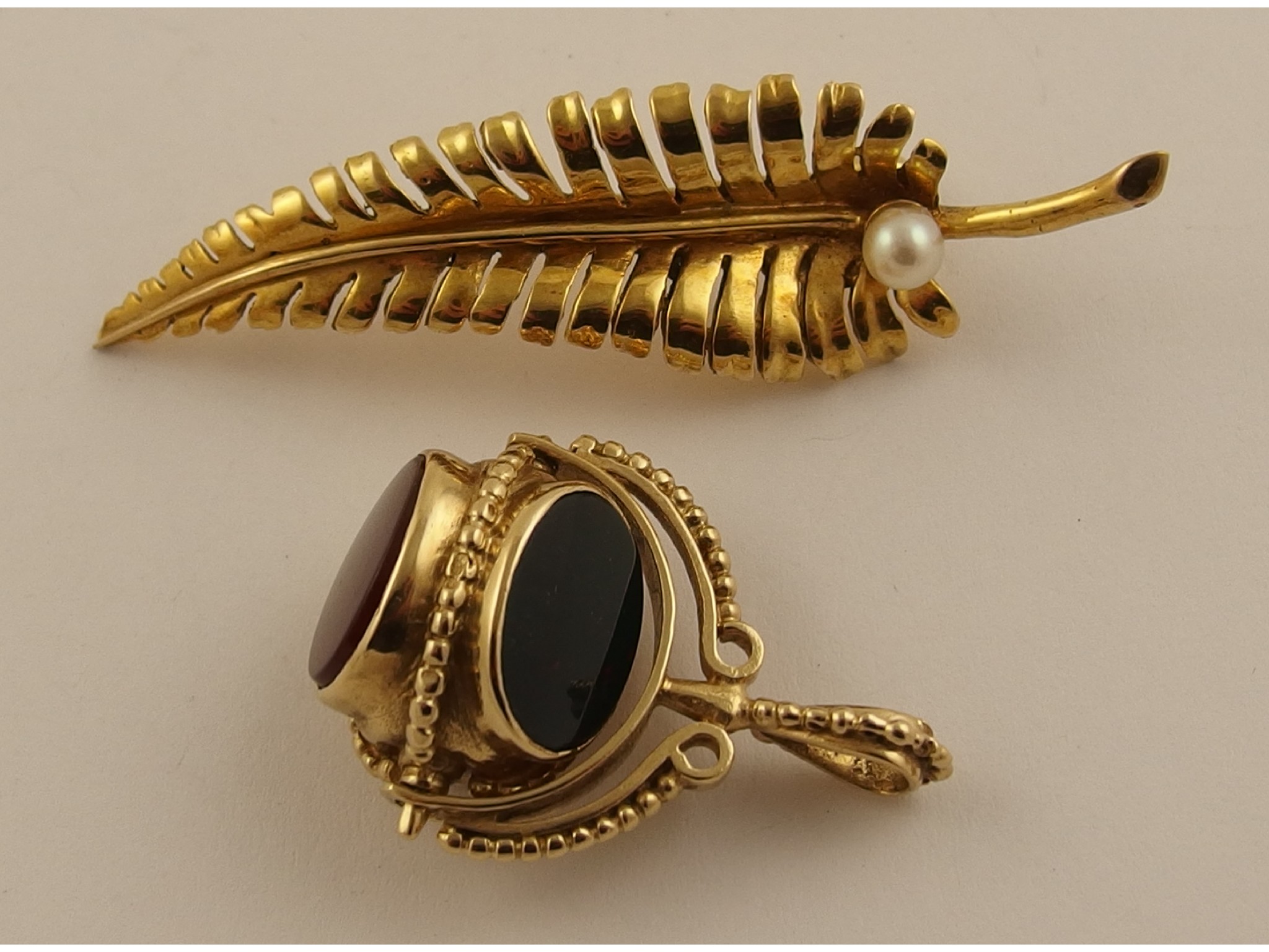 Appraisal: A ct pearl set fern brooch and a ct three