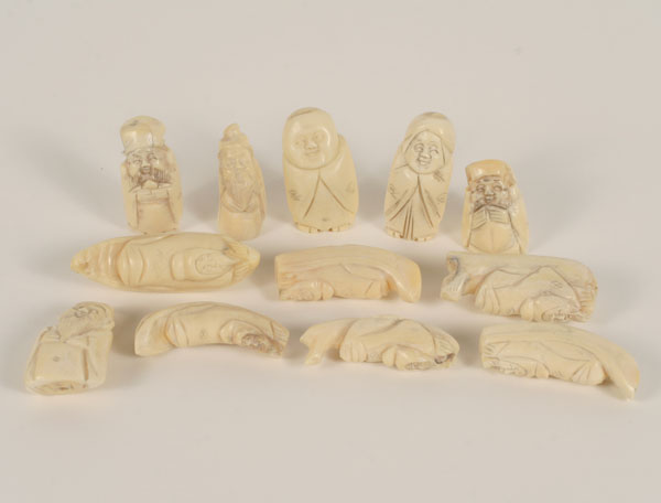 Appraisal: Lot of carved bone tooth Japanese Netsuke All inscribed Longest