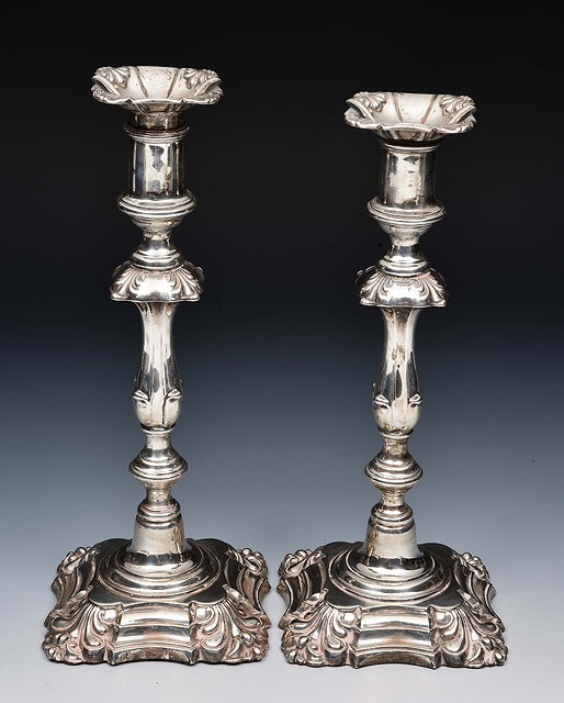 Appraisal: Pair of silver George I style candlesticksBirmingham by Elkington Co