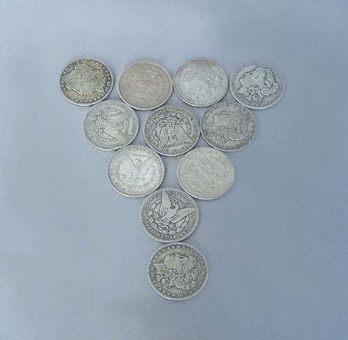 Appraisal: Eleven Morgan O silver dollars - - - and -